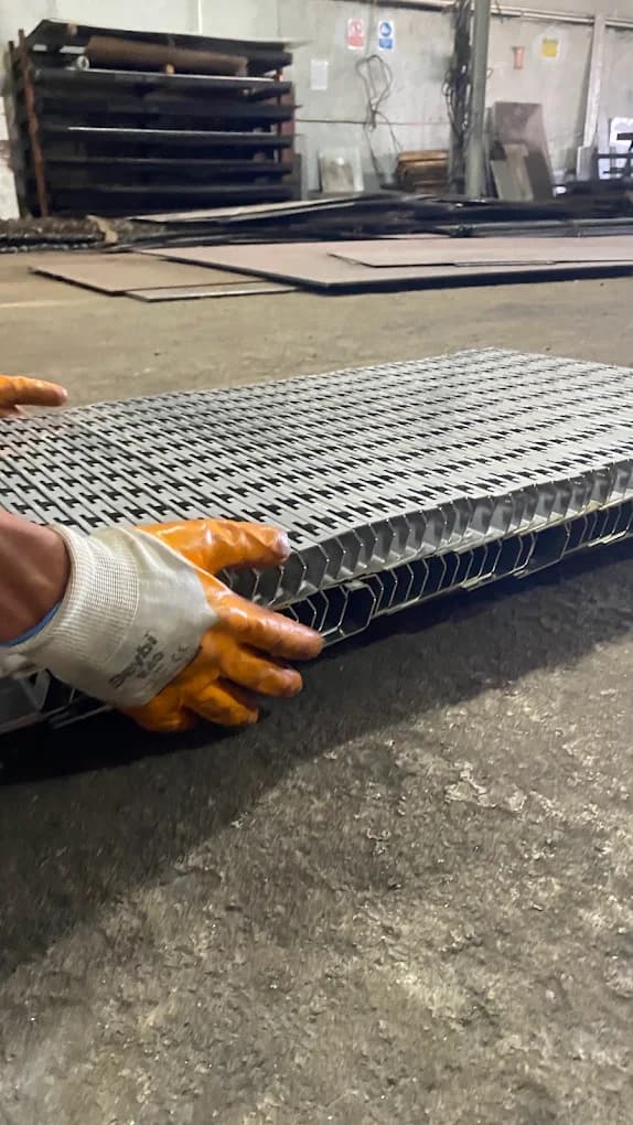 Panel bent from thin perforated sheet