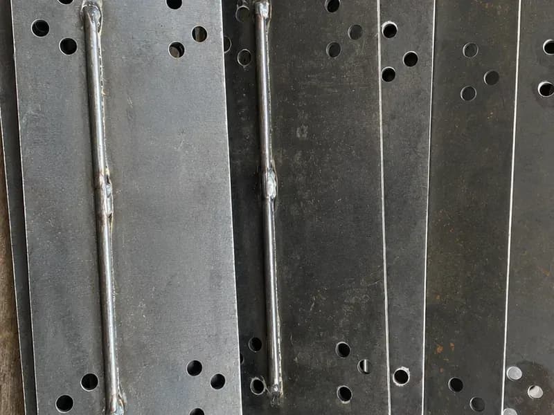 A weld seam run the full length of sheet metal parts