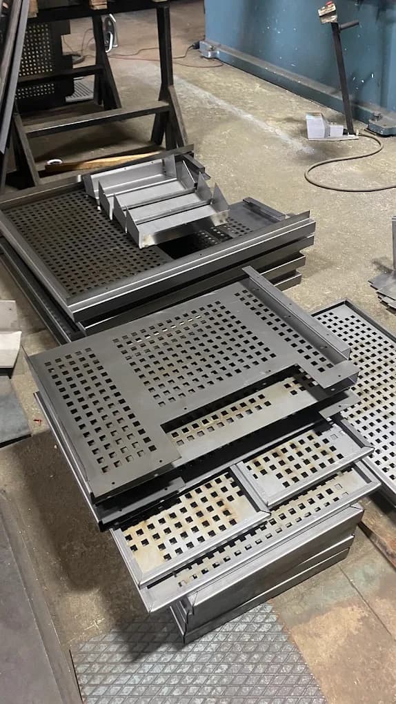 Cut and bent perforated sheet metal parts